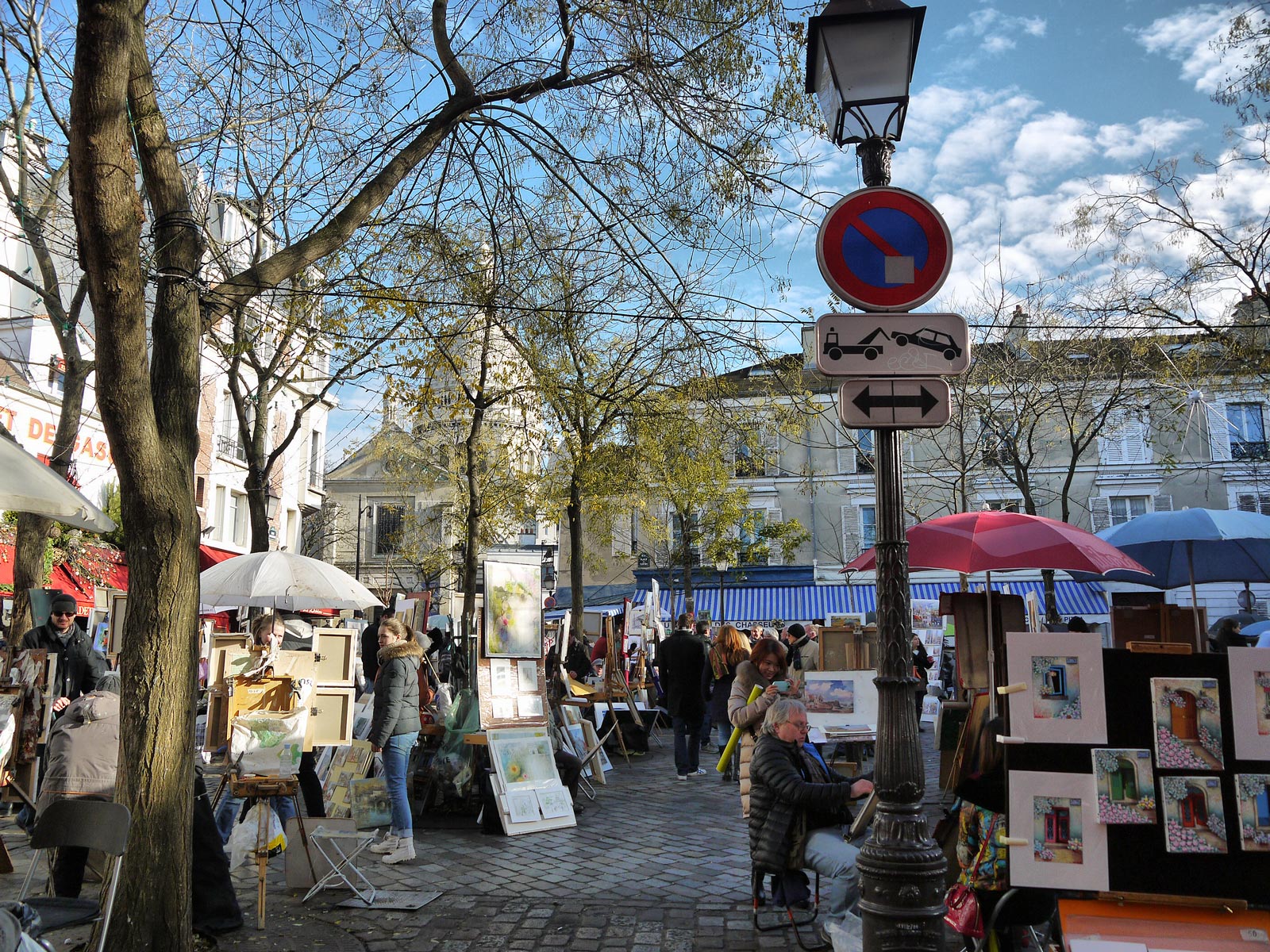 Artists At The Place Du Tertre In Montmartre Paris France Go To Travel Guides